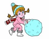 Niña con gran bola de nieve