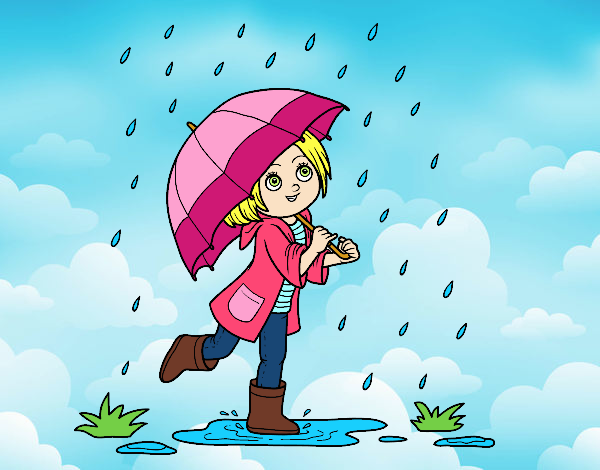 Niña con paraguas bajo la lluvia