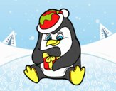 Un pingüino con regalo de Navidad