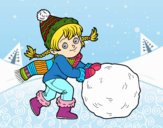 Niña con gran bola de nieve