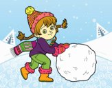 Niña con gran bola de nieve