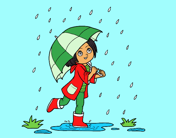 Niña con paraguas bajo la lluvia