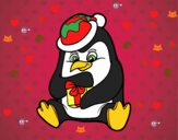 Un pingüino con regalo de Navidad