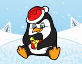 Un pingüino con regalo de Navidad