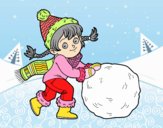 Niña con gran bola de nieve