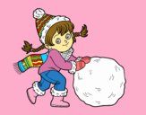 Niña con gran bola de nieve