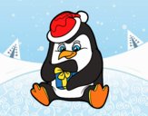 Un pingüino con regalo de Navidad