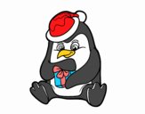 Un pingüino con regalo de Navidad