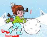 Niña con gran bola de nieve