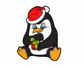 Un pingüino con regalo de Navidad