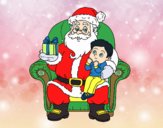 Papá Noel y niño en Navidad