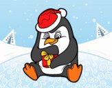 Un pingüino con regalo de Navidad