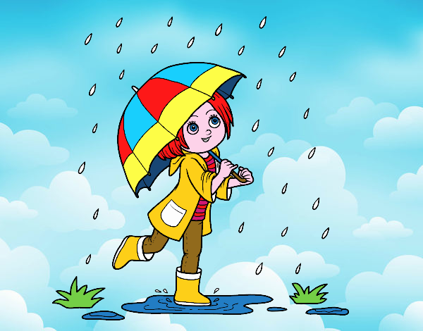 Niña con paraguas bajo la lluvia