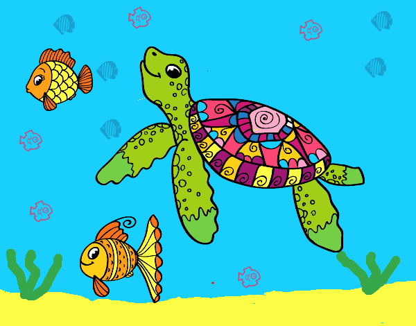 Tortuga de mar con peces