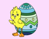 Pollito simpático con huevo de Pascua