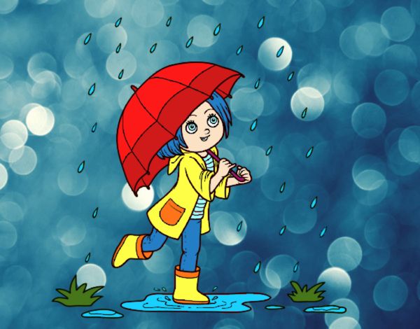 Niña con paraguas bajo la lluvia