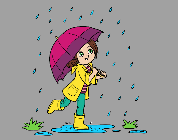 Niña con paraguas bajo la lluvia