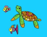 Tortuga de mar con peces