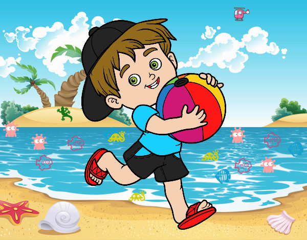 Niño jugando con balón de playa