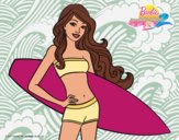 Barbie con tabla de surf