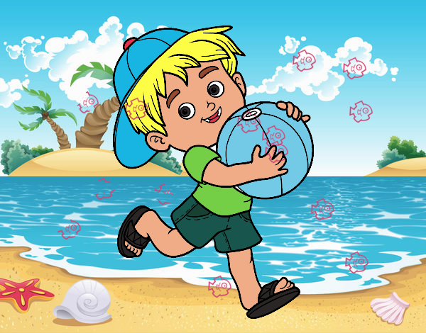 Niño jugando con balón de playa