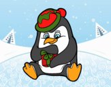 Un pingüino con regalo de Navidad