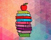 Libros y manzana