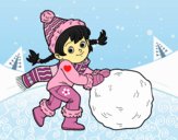 Niña con gran bola de nieve