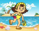 Niña con cubo y pala de playa