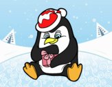 Un pingüino con regalo de Navidad