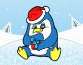 Un pingüino con regalo de Navidad