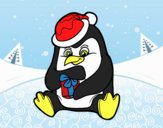 Un pingüino con regalo de Navidad