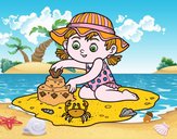 Una niña jugando en la playa