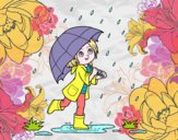 Niña con paraguas bajo la lluvia