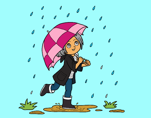 Niña con paraguas bajo la lluvia