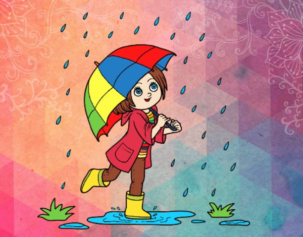 Niña con paraguas bajo la lluvia