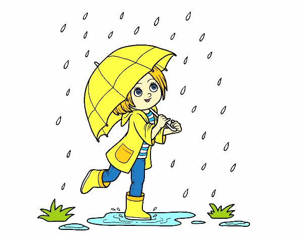 Niña con paraguas bajo la lluvia