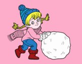 Niña con gran bola de nieve