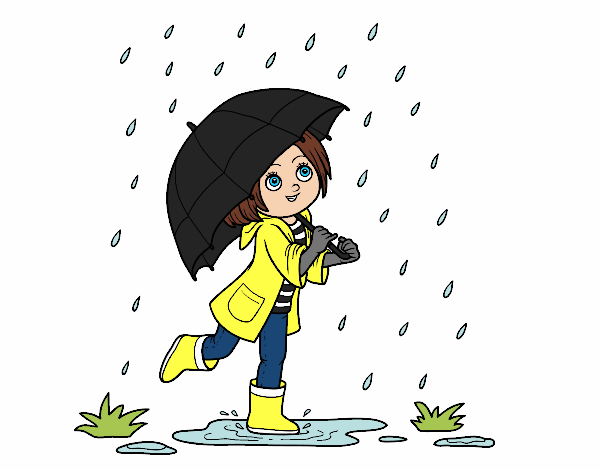 Niña con paraguas bajo la lluvia