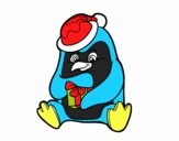 Un pingüino con regalo de Navidad